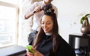 A woman having her hair done in a salon
