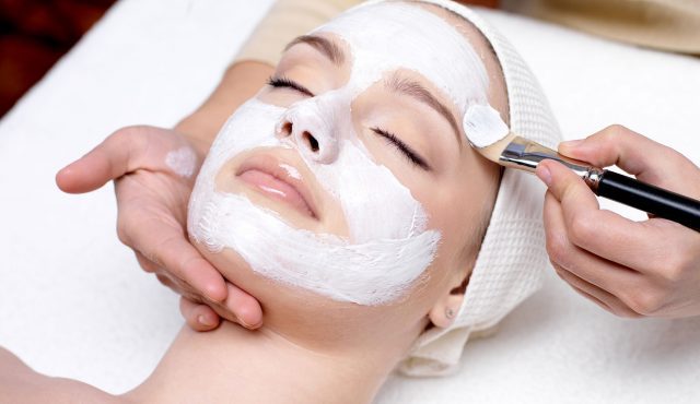 Woman-having-facial-mask-at-beauty-salon-133557705_3645x2734