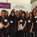 ray cochrane beauty college people standing for a photo