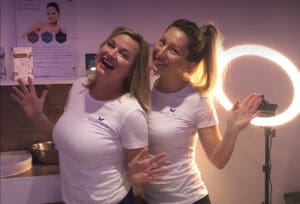 Two ladies celebrating that they have won the Chelsea, London based Beau Skin clinic award